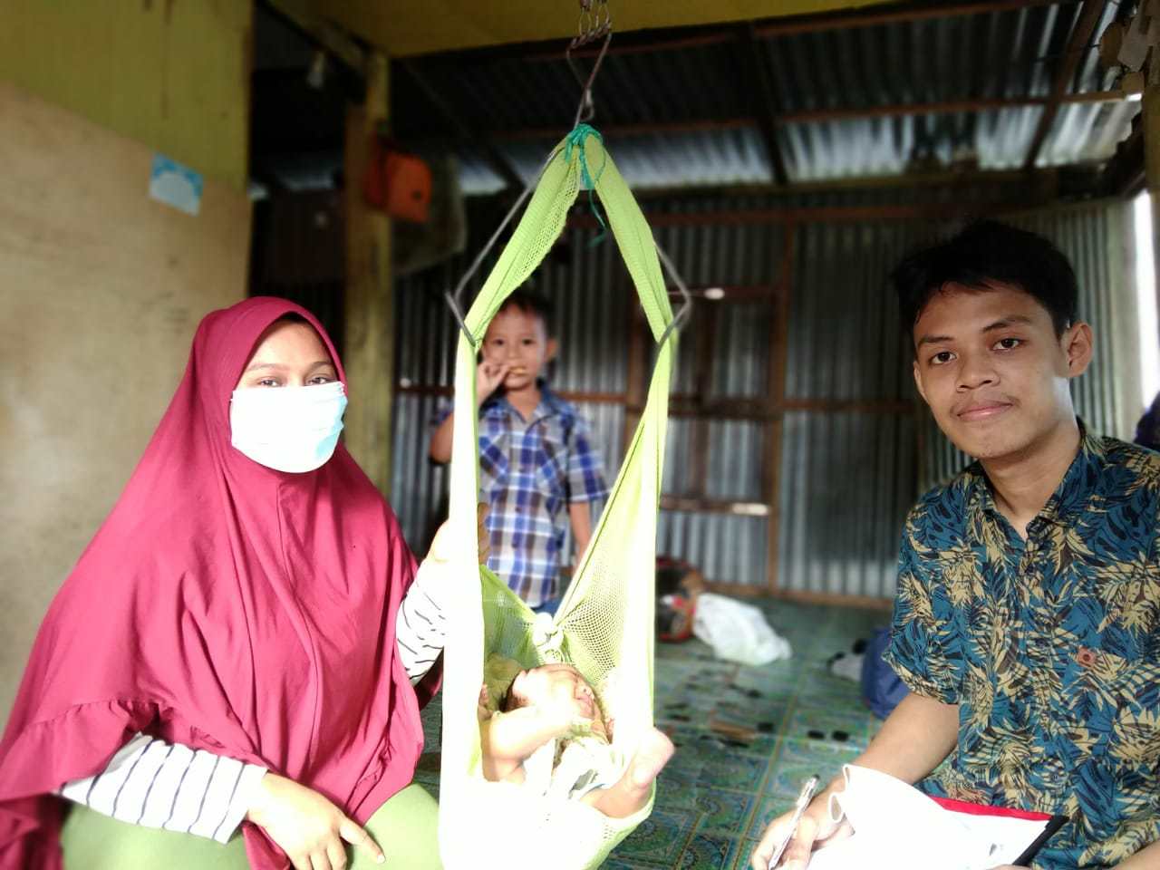 Pemantauan tumbuh kembang bayi dan masa nifas (kunjungan ketiga)